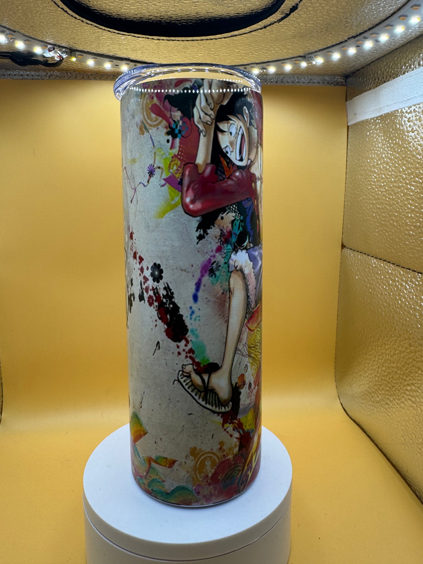 Colorful cylindrical product on a stand with a patterned design